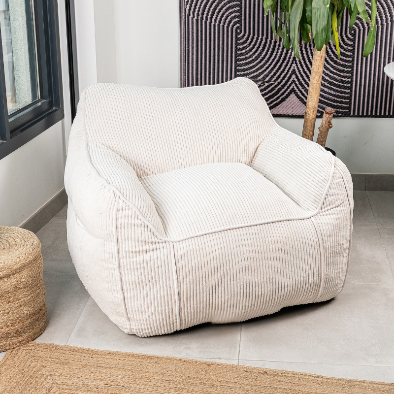 Pouf fauteuil en velours côtelé